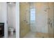 Modern bathroom features a glass shower and toilet with a view at 2700 Las Vegas Blvd # 4305, Las Vegas, NV 89109