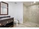 Bathroom showcases a glass shower and stylish granite sink and vanity at 2700 Las Vegas Blvd # 4305, Las Vegas, NV 89109