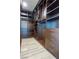 A large walk-in closet is well-organized with wood shelving and drawers at 2700 Las Vegas Blvd # 4305, Las Vegas, NV 89109