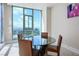 Cozy dining area with circular table and chairs with city views at 2700 Las Vegas Blvd # 4305, Las Vegas, NV 89109