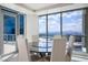 Refined dining area with a round table, comfortable seating, and expansive city views through large windows at 2700 Las Vegas Blvd # 4305, Las Vegas, NV 89109