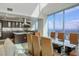 Modern kitchen and dining room featuring stone countertops, stainless steel appliances, and city views at 2700 Las Vegas Blvd # 4305, Las Vegas, NV 89109