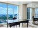 Office space with sleek black desk and chair offering stunning views of the city skyline through large windows at 2700 Las Vegas Blvd # 4305, Las Vegas, NV 89109