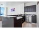 Modern wet bar features sleek cabinets, countertop, and stainless steel appliances at 2700 Las Vegas Blvd # 4305, Las Vegas, NV 89109