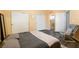 Comfortable bedroom with a relaxed atmosphere, closet, bathroom access and modern design at 2781 Dunstan Way, Las Vegas, NV 89123