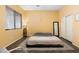 Inviting bedroom features a comfy bed, large window, contemporary decor and ample space at 2781 Dunstan Way, Las Vegas, NV 89123
