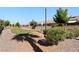 A scenic view of the community walking path, lined with lush landscaping and well-maintained homes at 2781 Dunstan Way, Las Vegas, NV 89123