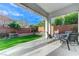 Back patio boasts pavers, and built-in seating, creating a perfect outdoor dining or lounging space at 3144 Tronzano Ave, Henderson, NV 89044