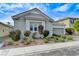Charming single-story home featuring a well-manicured lawn and attractive curb appeal at 3144 Tronzano Ave, Henderson, NV 89044