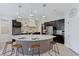 Gourmet kitchen featuring a large island and stainless steel appliances at 3144 Tronzano Ave, Henderson, NV 89044