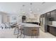 Modern kitchen with an island, stainless steel appliances, and ample counter space at 3144 Tronzano Ave, Henderson, NV 89044