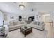 Spacious living area with open floor plan, comfortable sofas, and modern furnishings at 3144 Tronzano Ave, Henderson, NV 89044
