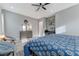 View of a spacious main bedroom with a grey dresser and comfortable seating area at 3144 Tronzano Ave, Henderson, NV 89044