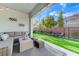Inviting covered patio with comfortable seating overlooking a pristine backyard at 3144 Tronzano Ave, Henderson, NV 89044