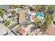 Aerial view of home featuring an inground pool, patio area and a solar panel system at 3155 Duneville St, Las Vegas, NV 89146