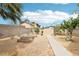 Spacious backyard with a shed and garden boxes offering a versatile outdoor space for various activities at 3155 Duneville St, Las Vegas, NV 89146