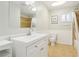 Bathroom featuring a large vanity, ceramic tile floors, and a shower tub combo at 3155 Duneville St, Las Vegas, NV 89146