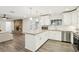 Updated kitchen featuring granite counters, stainless steel appliances, and an island at 3155 Duneville St, Las Vegas, NV 89146