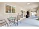 Inviting covered patio with ample seating and convenient access to outdoor cooking and dining at 3155 Duneville St, Las Vegas, NV 89146