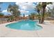 Backyard pool and spa with mature landscaping that offers a tranquil retreat for relaxation and entertainment at 3155 Duneville St, Las Vegas, NV 89146