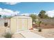 A storage shed for gardening equipment, tools, and outdoor gear, enhancing the property's functionality at 3155 Duneville St, Las Vegas, NV 89146