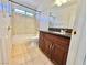 Updated bathroom featuring granite counters, tiled shower, and a modern design at 3919 Lilac Haze St, Las Vegas, NV 89147