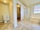 Bathroom featuring a shower over tub, toilet, vanity, and walk-in closet at 3919 Lilac Haze St, Las Vegas, NV 89147