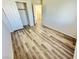 Bedroom featuring wood-look flooring and natural light at 3919 Lilac Haze St, Las Vegas, NV 89147