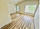 Bright bedroom with laminate flooring and windows providing natural light at 3919 Lilac Haze St, Las Vegas, NV 89147