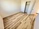 Bedroom featuring a closet and wood-look flooring throughout at 3919 Lilac Haze St, Las Vegas, NV 89147