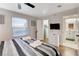 Bedroom featuring hardwood floors, a ceiling fan and a flat screen television at 4200 S Valley View Blvd # 2085, Las Vegas, NV 89103