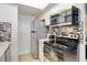 Compact kitchen with stainless steel appliances and backsplash design at 4200 S Valley View Blvd # 2085, Las Vegas, NV 89103