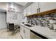 Kitchen with stainless steel appliances, white cabinets and a cozy eating nook at 4200 S Valley View Blvd # 2085, Las Vegas, NV 89103