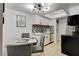 Modern kitchen and dining area with stainless steel appliances and a mosaic backsplash at 4200 S Valley View Blvd # 2085, Las Vegas, NV 89103