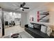 Comfortable living room with easy kitchen access, offers a cozy space with modern decor and ample natural light at 4200 S Valley View Blvd # 2085, Las Vegas, NV 89103