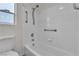 Cozy bathroom featuring a tiled shower and bathtub combination at 4537 Colonial Canyon St, North Las Vegas, NV 89031
