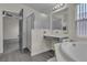 Bathroom featuring a shower, soaking tub, vanity area and tile accents at 4537 Colonial Canyon St, North Las Vegas, NV 89031