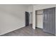 Spacious bedroom with laminate floors, closet, and interior door, providing both comfort and ample storage at 4537 Colonial Canyon St, North Las Vegas, NV 89031