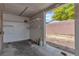 Attached garage providing ample space for parking and storage with a backyard view at 4537 Colonial Canyon St, North Las Vegas, NV 89031