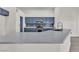 Kitchen island with light-colored countertops and blue cabinets with stainless steel appliances at 4537 Colonial Canyon St, North Las Vegas, NV 89031