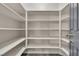 Walk-in pantry with multiple shelves for optimal storage and organization at 4537 Colonial Canyon St, North Las Vegas, NV 89031