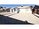 View of the backyard with a low block wall and a fence at 4651 Wild Oak Way, North Las Vegas, NV 89031