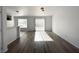 Bright dining area featuring new floors and sliding door access to the backyard at 4651 Wild Oak Way, North Las Vegas, NV 89031