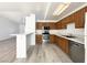 An updated kitchen featuring stainless steel appliances and a breakfast bar at 4651 Wild Oak Way, North Las Vegas, NV 89031