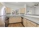 Bright kitchen featuring granite counters, stainless steel appliances, and light wood cabinets and flooring at 5250 S Rainbow Blvd # 2070, Las Vegas, NV 89118