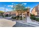 Charming home with well-maintained landscaping, a two-car garage, and inviting front entrance exudes curb appeal at 5384 Candlespice Way, Las Vegas, NV 89135