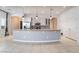 Open kitchen features modern appliances, stylish backsplash, and a large center island with pendant lighting at 5384 Candlespice Way, Las Vegas, NV 89135