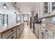 A gourmet kitchen featuring granite countertops, stainless steel appliances, and designer backsplash at 5384 Candlespice Way, Las Vegas, NV 89135