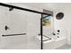 Modern bathroom showcases a glass-enclosed shower and soaking tub at 5530 Hill Spire St, Las Vegas, NV 89166