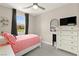 Relaxing bedroom with great natural light, a TV, and closet access at 5530 Hill Spire St, Las Vegas, NV 89166